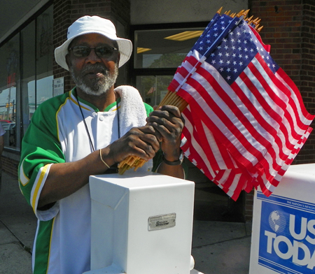 Man with flags at parade