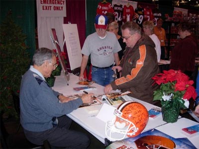 Sam Rutigliano signing helmet