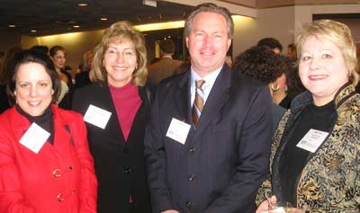 Anne Goodman and Bonnie MacPherson of the Cleveland Foodbank,  Sean Richardson of NCB and Marie Monago of the Cleveland Foundation