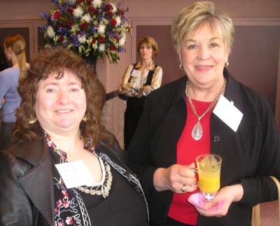 Cynthia Adamek and Marcie Sprosty of National Yellow Pages Media try the Squash soup