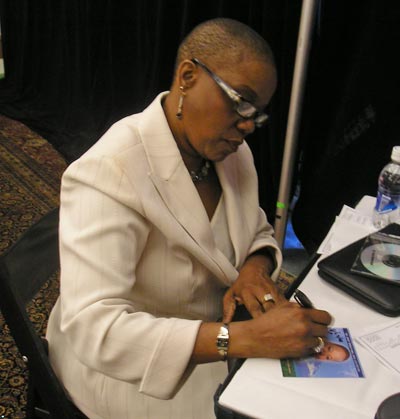 Keynote speaker Dr. Joyce Morley-Bell Ed.D signing autographs