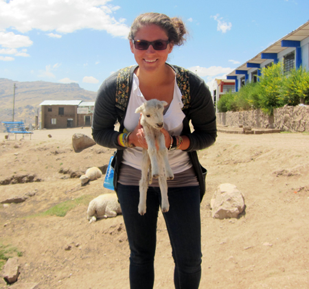 Katie Campbell-Morrison in Peace Corps in Peru with baby goat