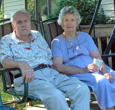 Ed and Helen Mugridge in a porch swing