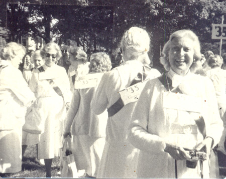 Ann Halle Little taking photographs at her 45th Reunion in 1980