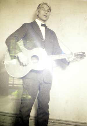 Helga's father Carl Sandburg with guitar