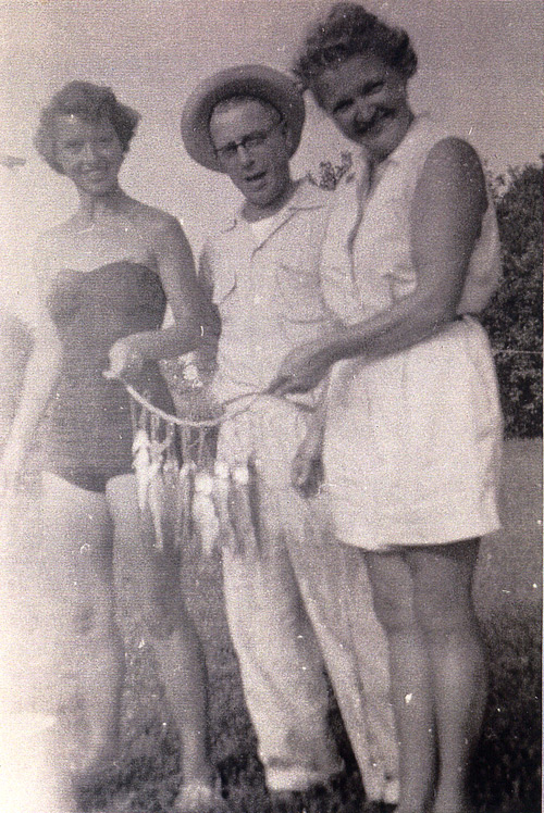 Jenny and her parents fishing in 1950 Sandusky fishing w Mom and Dad