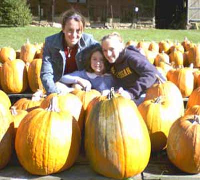 Lisa Spicer daughters in the pumpkin patch