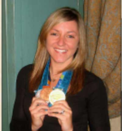 Diana Munz with Championship medals