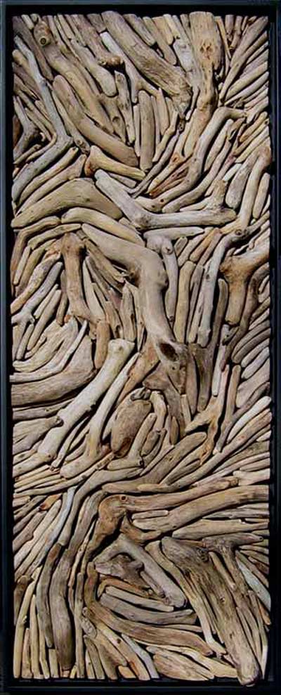 Susie Frazier Mueller Art work titled “Perseverance.” Driftwood mounted onto wood. No paint added.