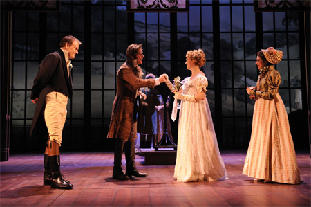 Robert Martin (center left, A.J. Cedeno) is congratulated by Emma (Sarah Nealis, center right) and Mr. Knightley (left, Mark L. Montgomery) on his engagement to Harriet (right, Carolyn Faye Kramer) in Emma, directed by Peter Amster, on stage at The Cleveland Play House in the Drury Theatre, February 26 - March 21. Photo credit: Roger Mastroianni