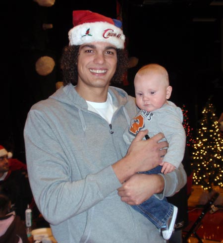 Cleveland Cavs Anderson Varejao with a tiny fan