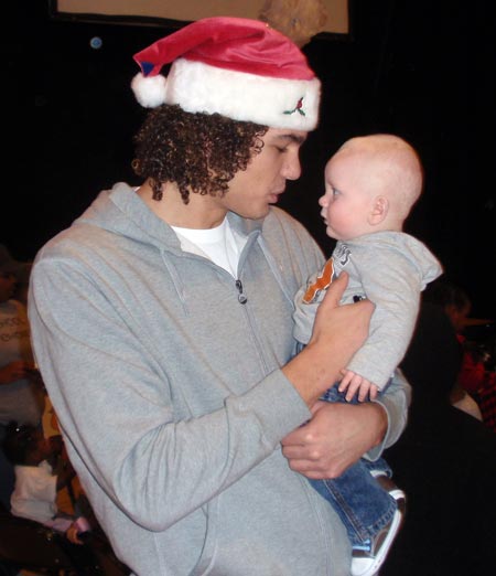 Cleveland Cavaliers Andy Varejao with a tiny fan