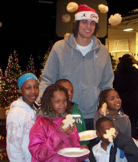 Cleveland Cavaliers Anderson Varejao with young fans