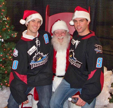 Lake Erie Monsters Darren Haydar and Philippe Dupuis with Santa Claus