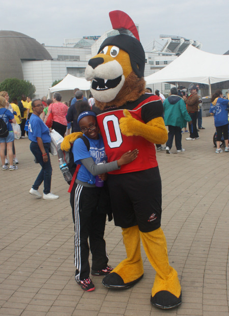 Rudi, the Cleveland Gladiator's mascot, with new friend
