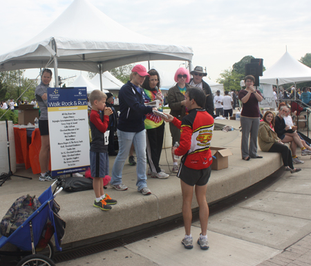 Race winner receiving a prize