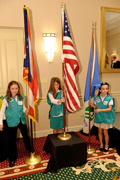 Gilr Scouts with flags