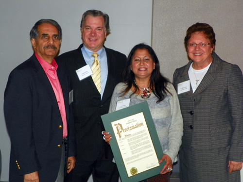 Nip Singh, Mayor Richard Bain, Rita Singh and Sister Diana Stano