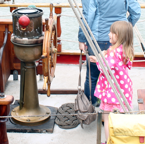 Little girl at wheel of Tall Ship in Cleveland