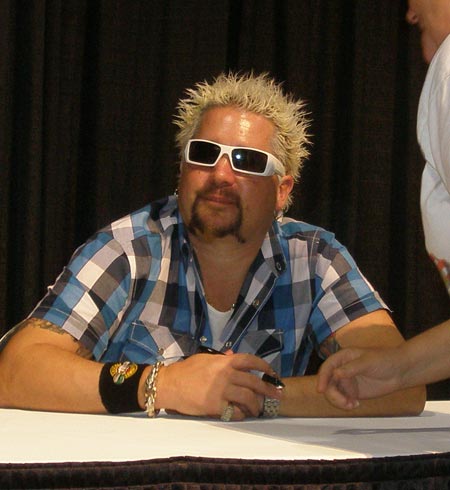 Food Network star Guy Fieri signing books
