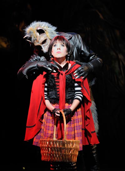 Hello Little Girl sings the Wolf (played by Derrick Cobey) to a frightened Little Red Ridinghood (portrayed by Erin Childs) in the Great Lakes Theater Festival production of Stephen Sondheim's enchanting musical Into the Woods.