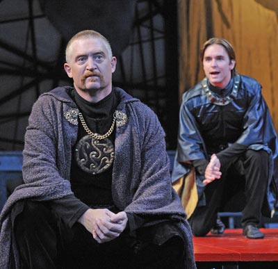 Beware Macduff (actor, David Anthony Smith. left).  Actor Phil Carroll, the unsuspecting future king Malcolm, advises Macbeth's slayer in the Great Lakes Theater Festival production of William Shakespeare's towering tragedy Macbeth