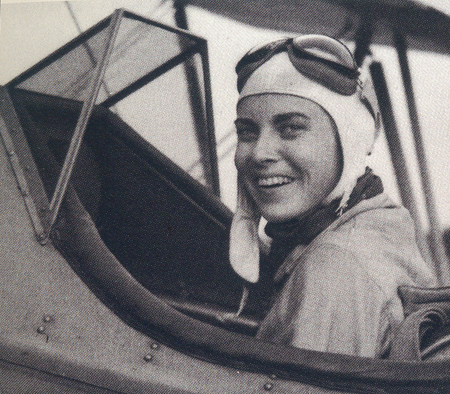 Ann Halle in the cockpit of a plane
