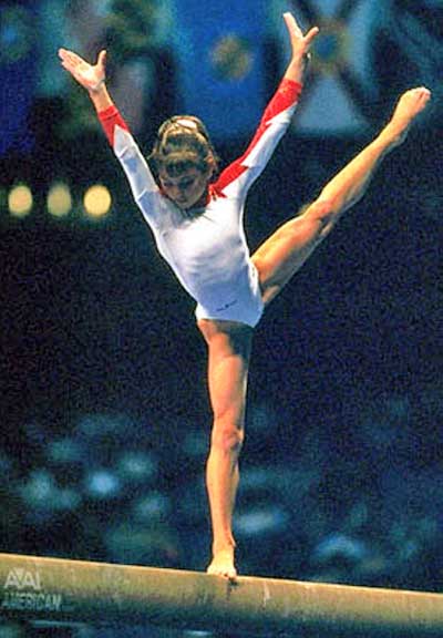 Young Gymnast Dominique Moceanu on the balance beam