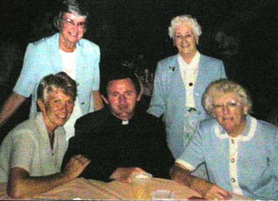 Helen Bacon with Father Devine and friends