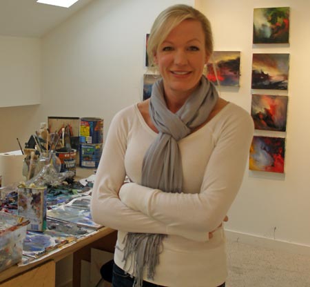 Lissa Bockrath Shapiro with paints at home