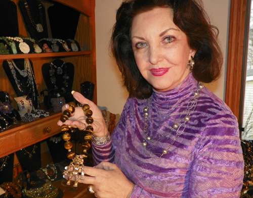 Maria Pujana at home with some of her jewelry designs
