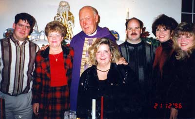 Mary Fitzpatrick with her children and a Priest friend
