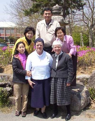 Sister Ann Patrick with other sisters and students in Korea