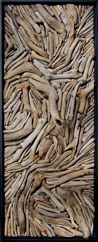 Susie Frazier Mueller Art work titled �Perseverance.� Driftwood mounted onto wood. No paint added.